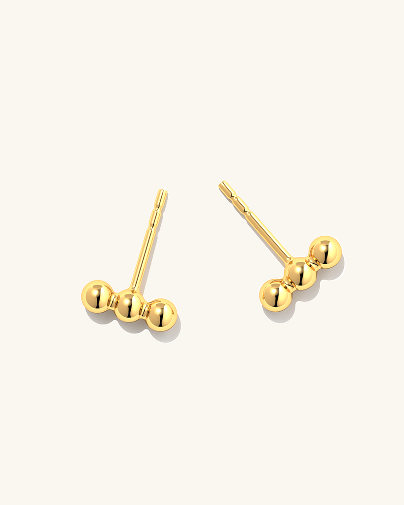 Gold Triple Dot earrings with minimalist design and 24-carat gold plating, perfect for everyday wear.