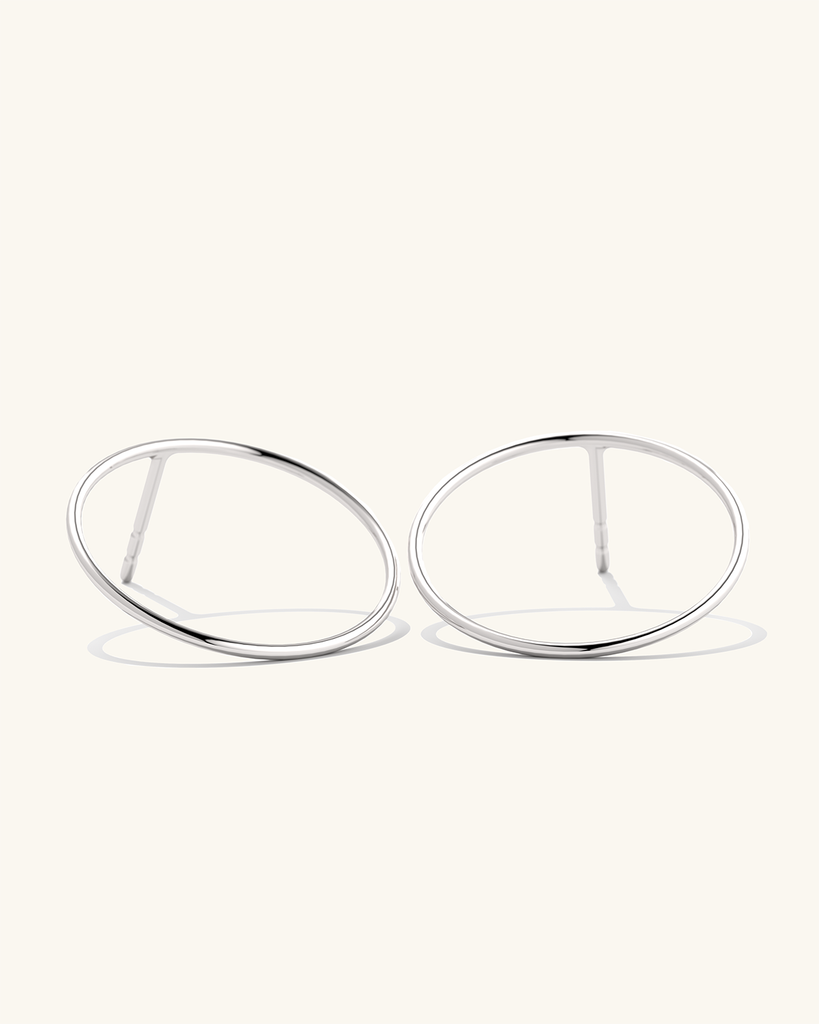 Platinum vermeil large hoop earring studs - a stylish and trendy accessory for a fashionable look.