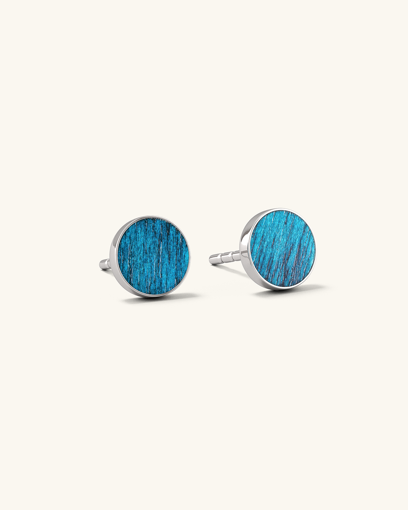Cosmic earrings - Handmade birch wood and sterling silver studs with supernova blue birch wood interior, plated with platinum.