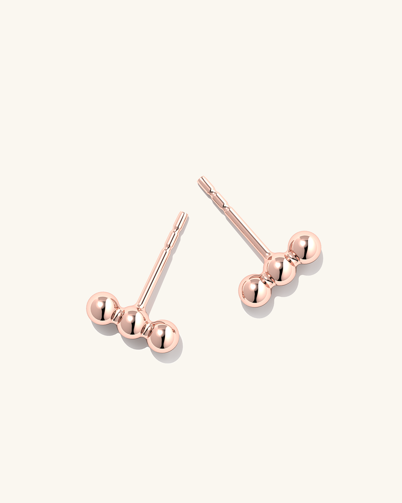 Stylish everyday silver Triple Dot earrings with a rose gold plating.