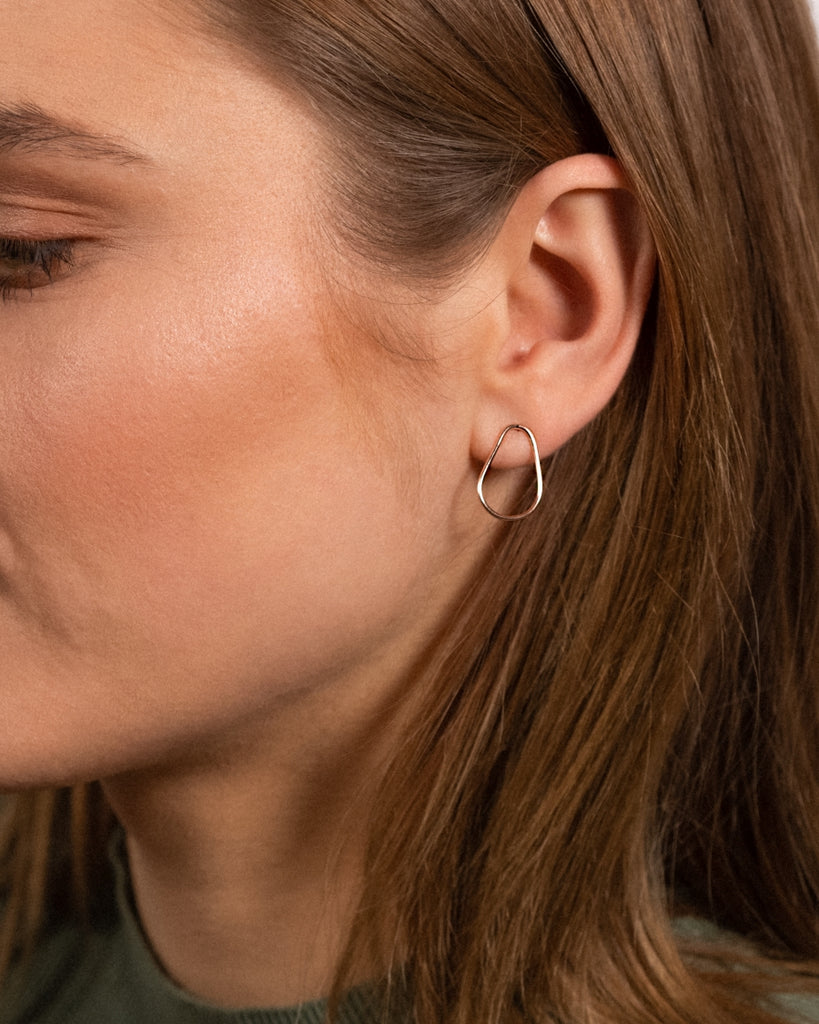 Model wearing Drop Earring Studs with 18k rose gold vermeil.