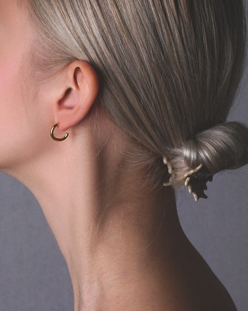 Elegant gold vermeil tiny Pepa hoop earrings.