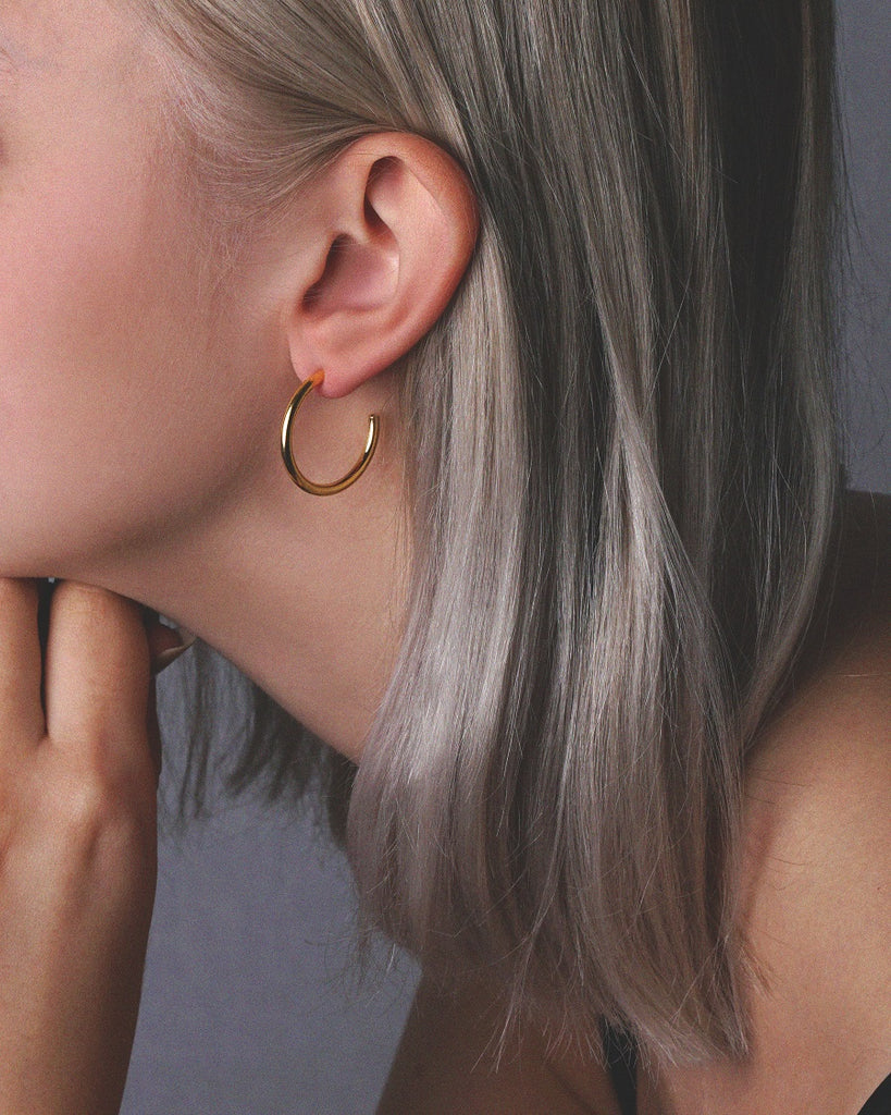 Elegant gold vermeil large Pepa hoop earrings.